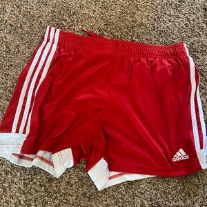 Red adidas running shorts. Women’s size large